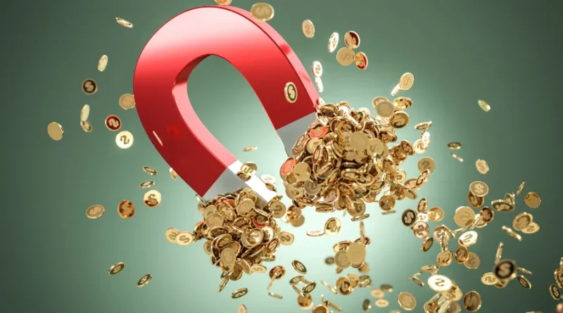 Ímã atraindo moedas de ouro.