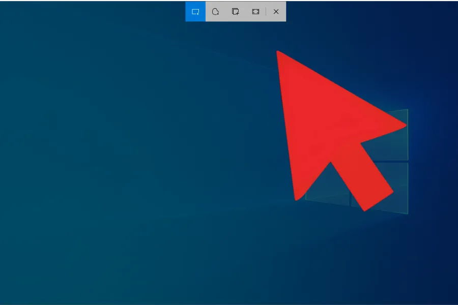 Seta vermelha apontando para ferramentas de captura de tela em um computador.